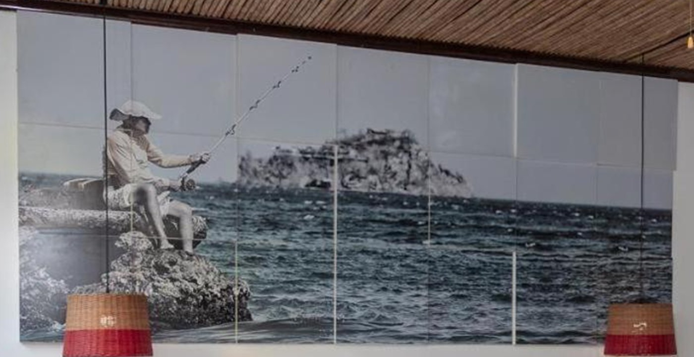 Cuadro del abuelo Juan Gerardo pescando, en la habitación El Viejo y El Mar